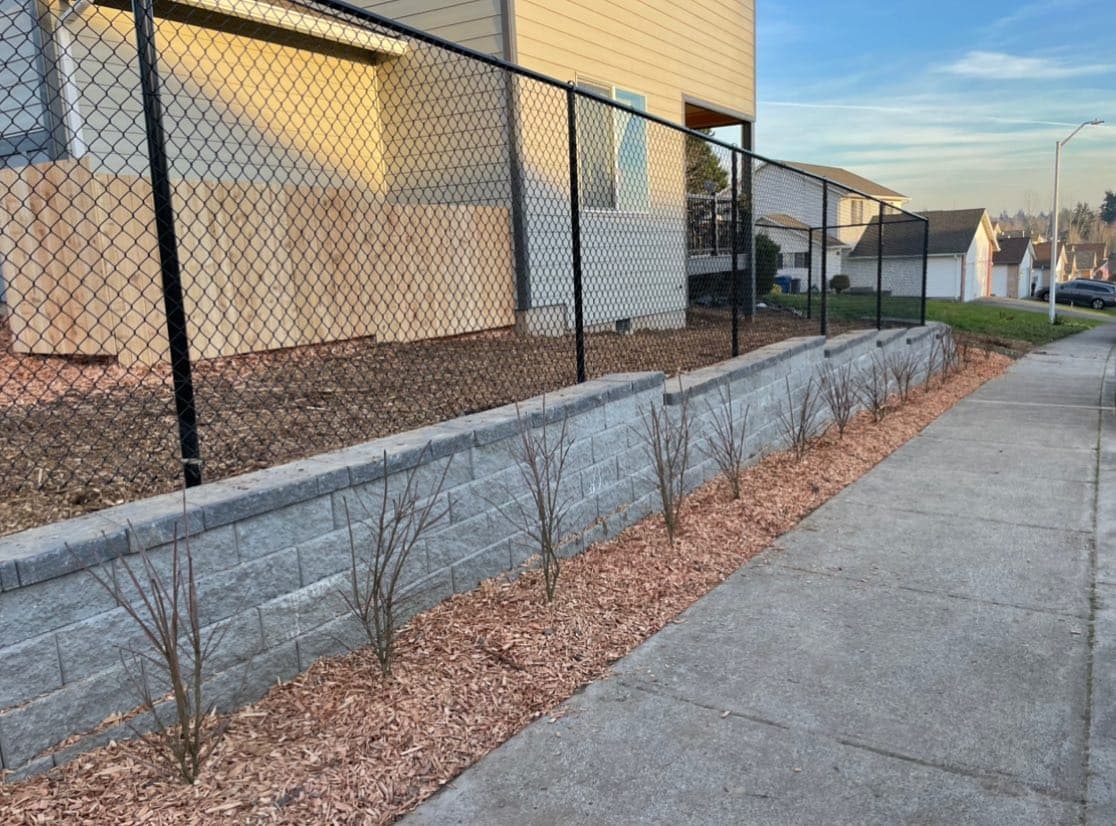 Multi-service hardscape install — pavers, walls, drainage