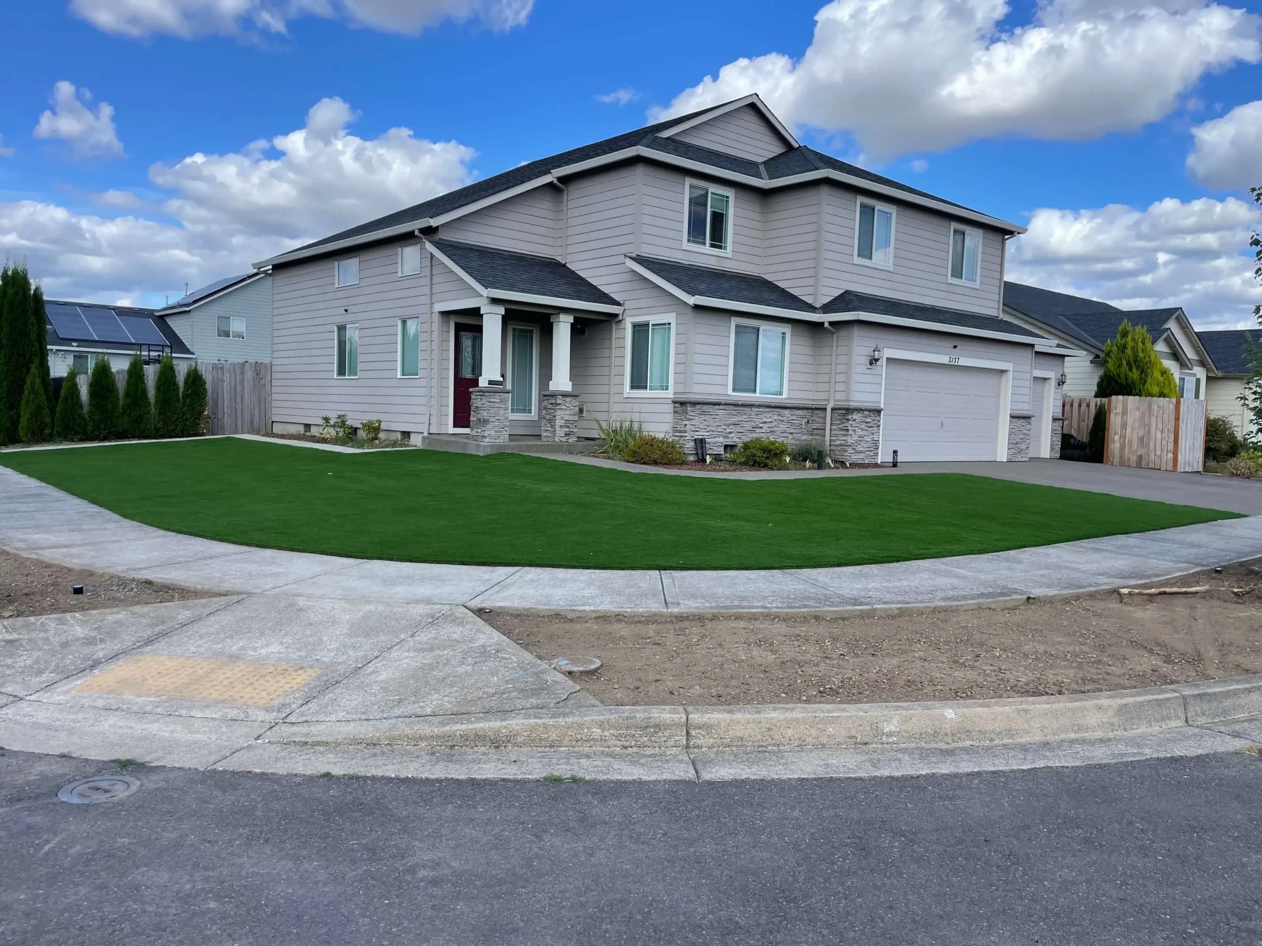 Front yard with maintained turf and clean edges